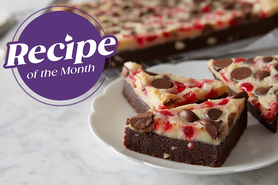 plate of chocolate and cherries bars cut into triangles