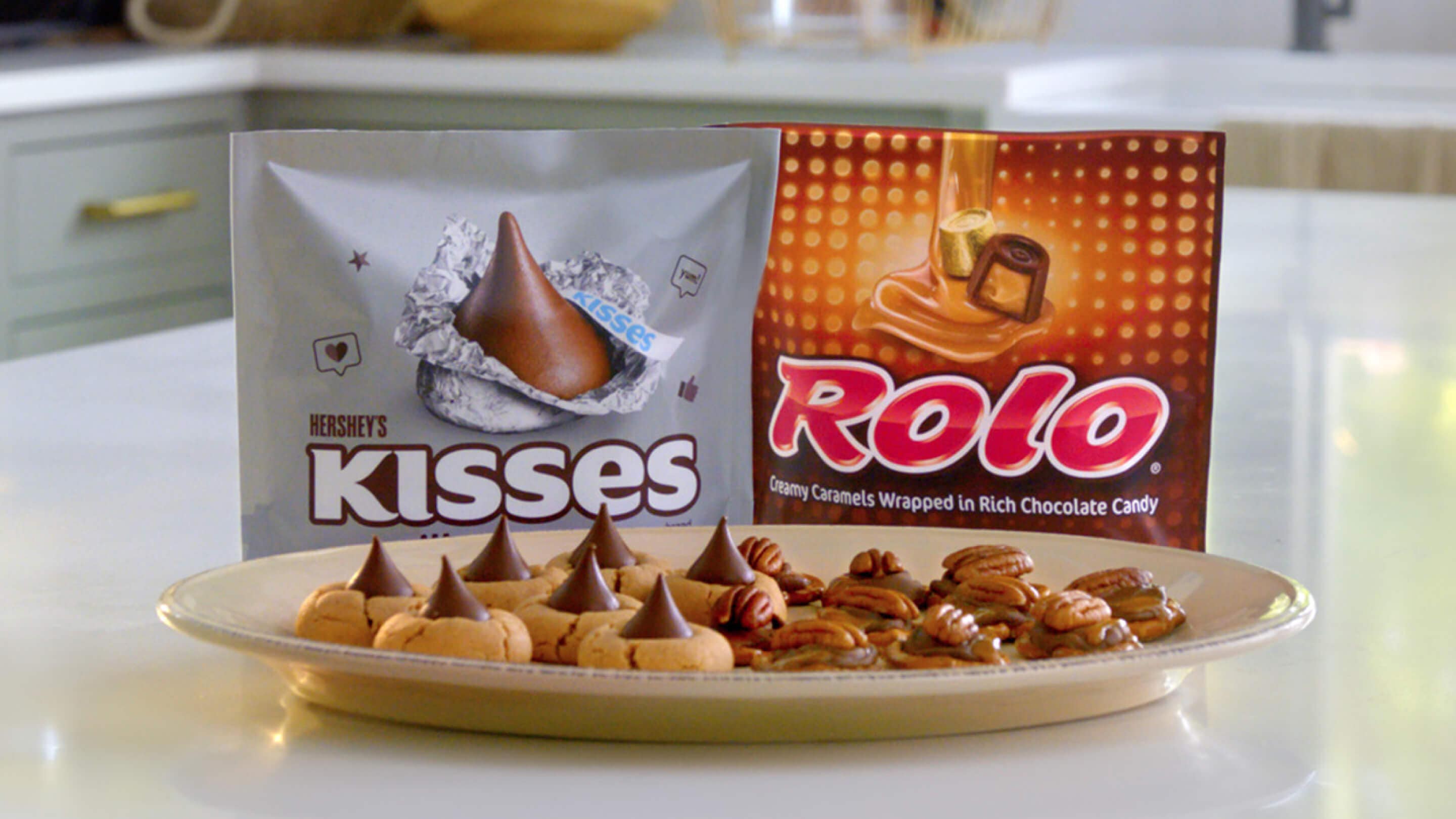 plate of treats made with hersheys kisses and rolo chocolate candies