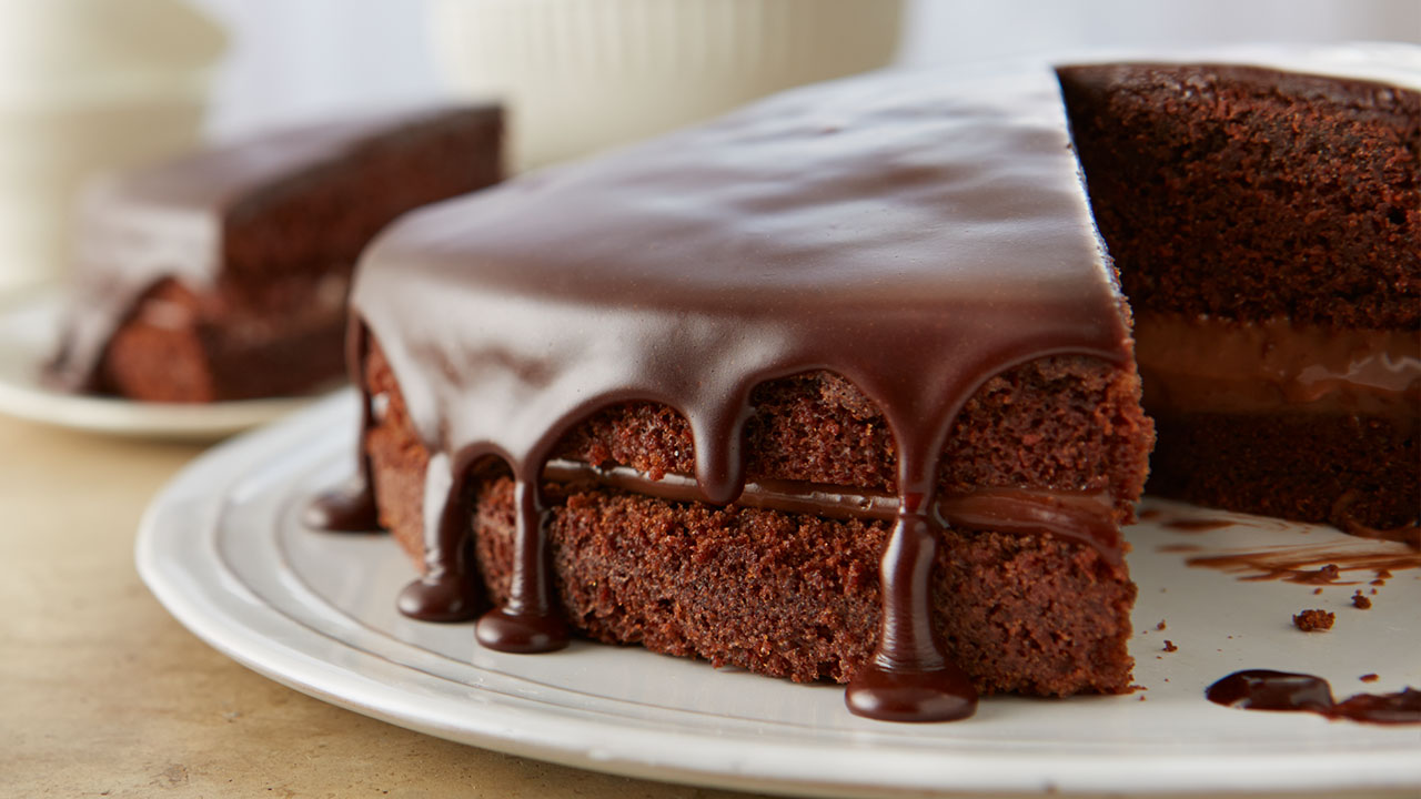 chocolate cake with slice removed and plated