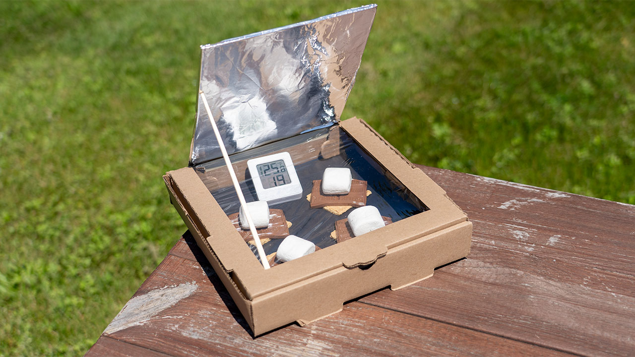 cooking smores outdoors in the solar oven