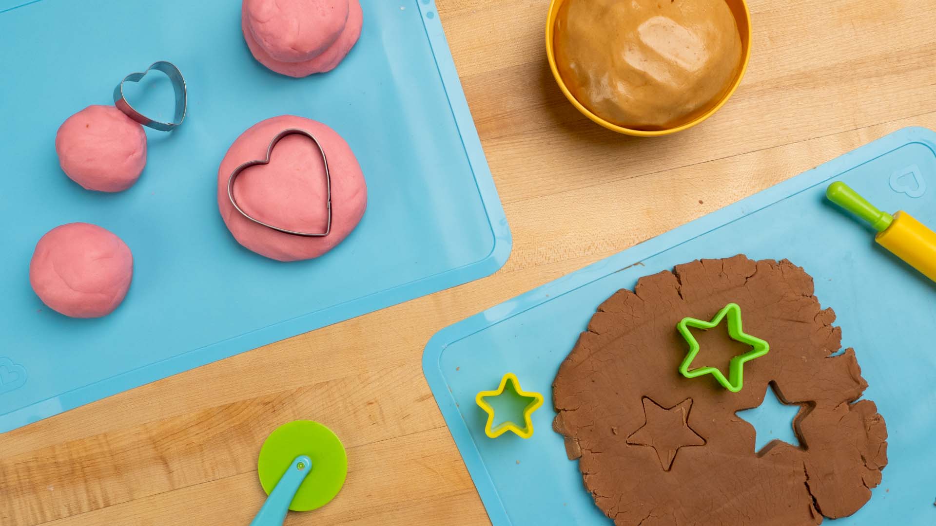 diy homemade play dough being cut into different shapes