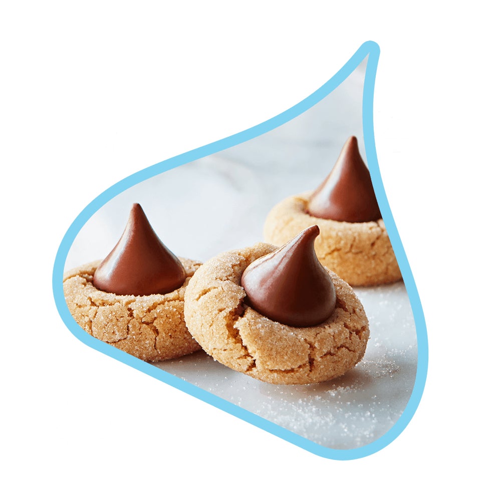 peanut butter blossom cookies topped with hersheys kisses