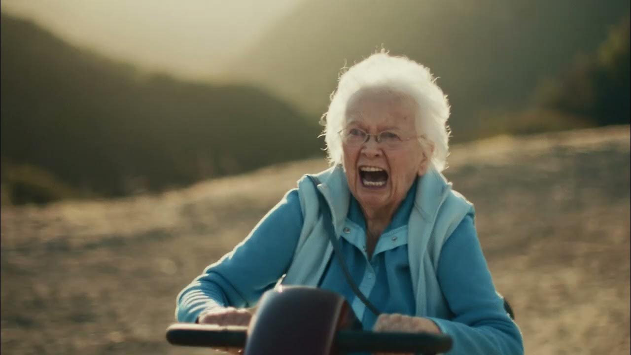 grandma riding on a motorized scooter