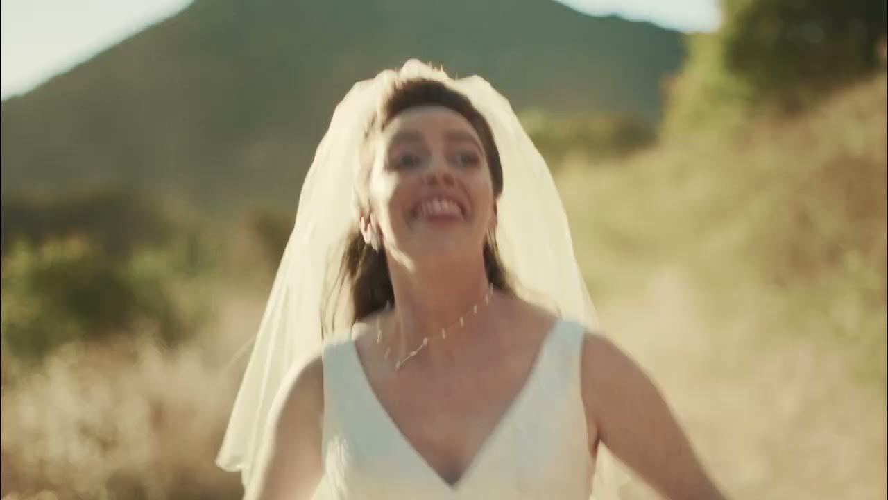 bride running in her wedding dress