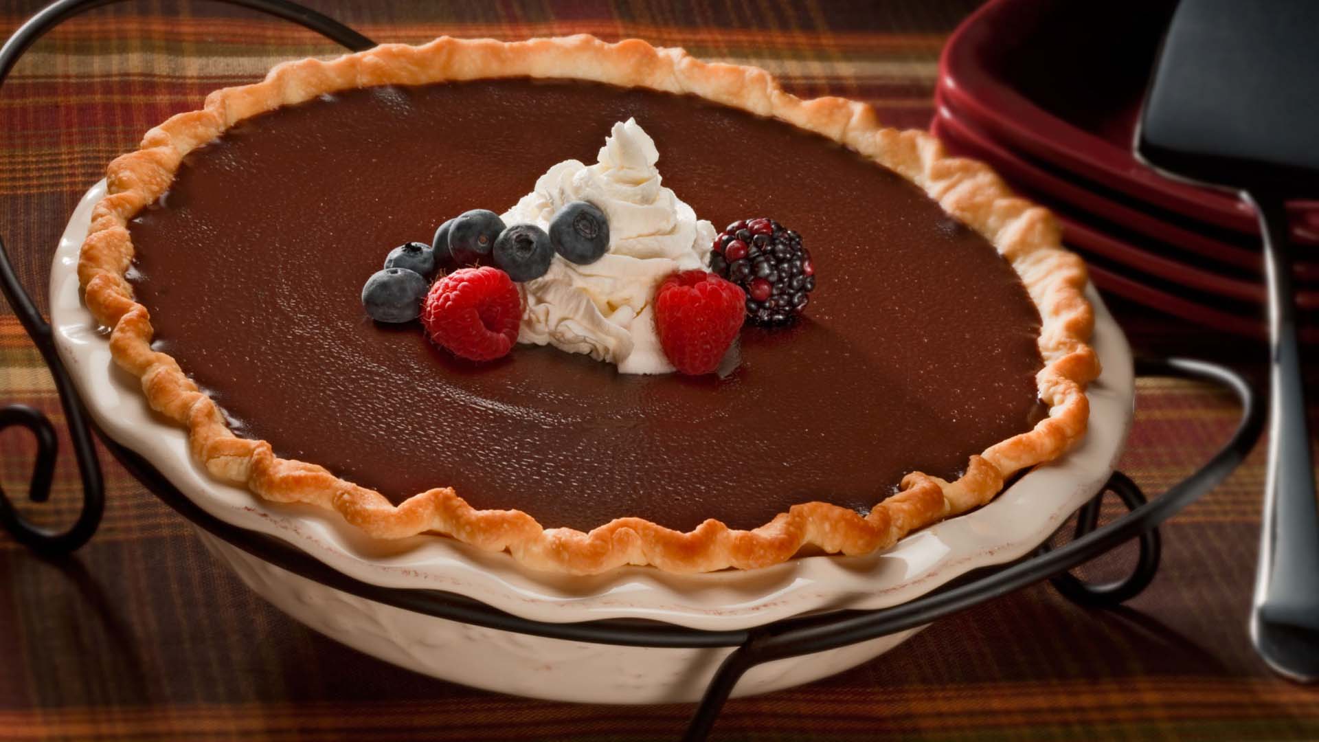 hersheys cocoa creme pie topped with whipped cream and fresh fruit