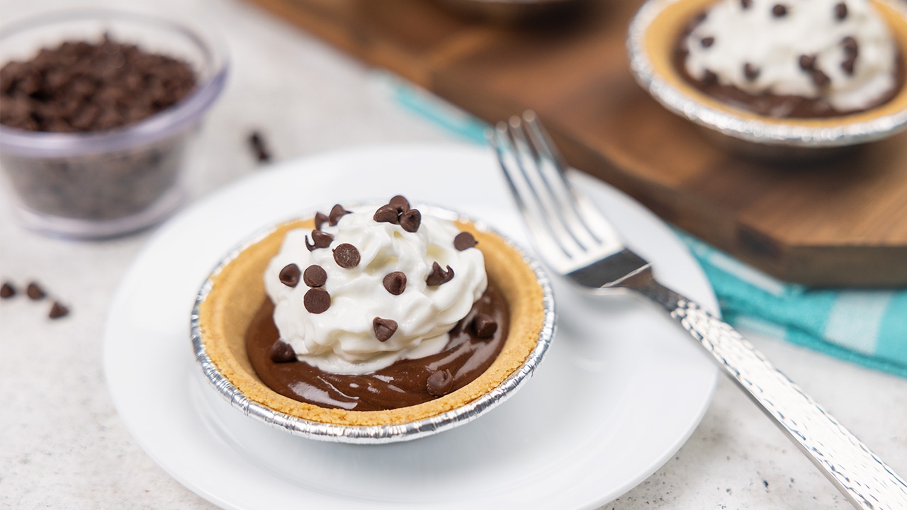 mini chocolate pies topped with whipped topping