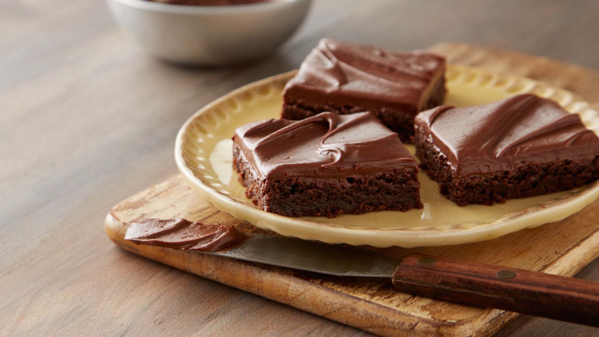 fresh batch of hersheys best brownies topped with chocolate frosting