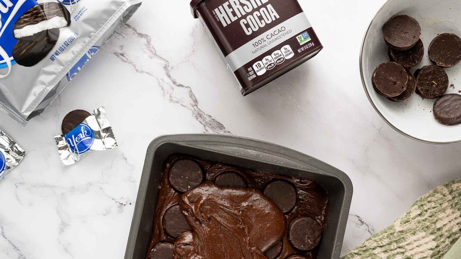 batter and peppermint patties in baking pan