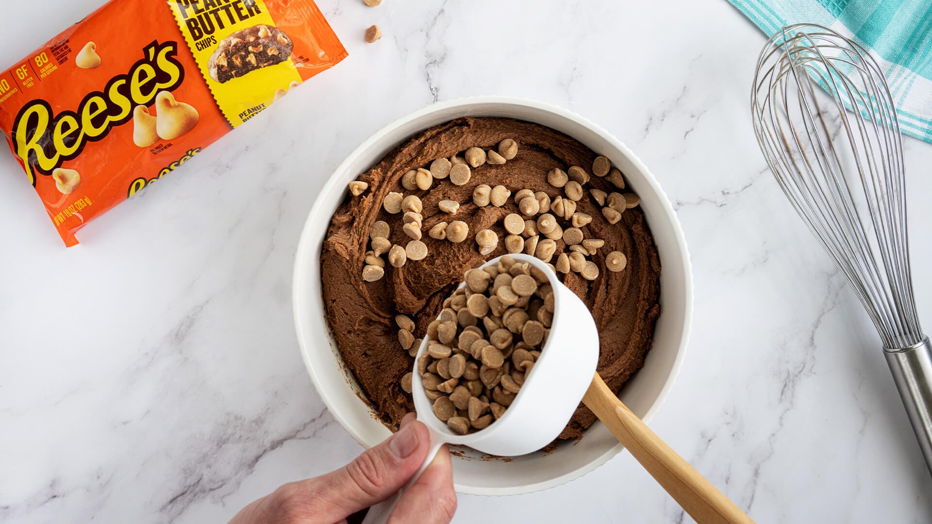 mixing in peanut butter chips