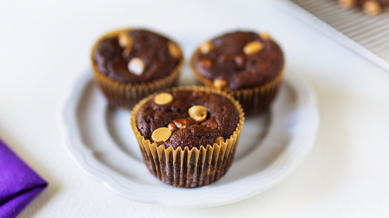 plate of chocolate peanut butter protein muffins