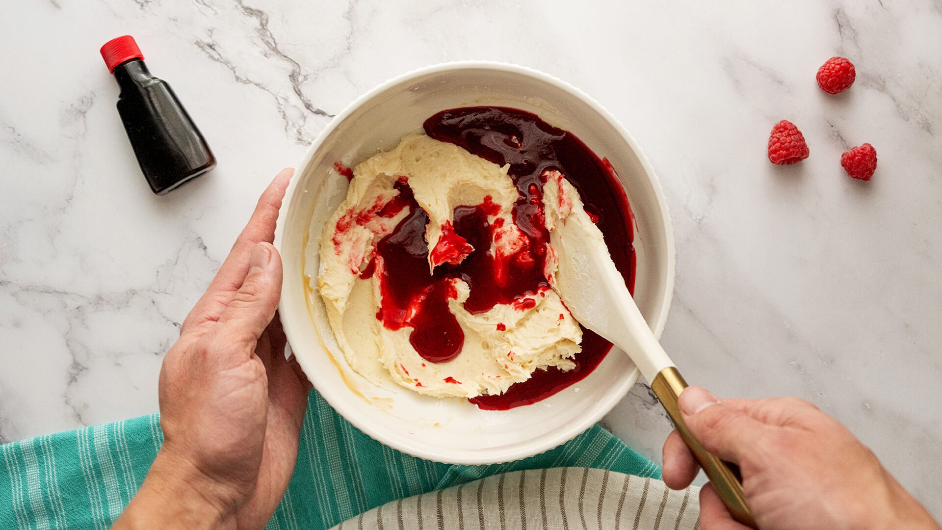 raspberry mixture stirred into icing