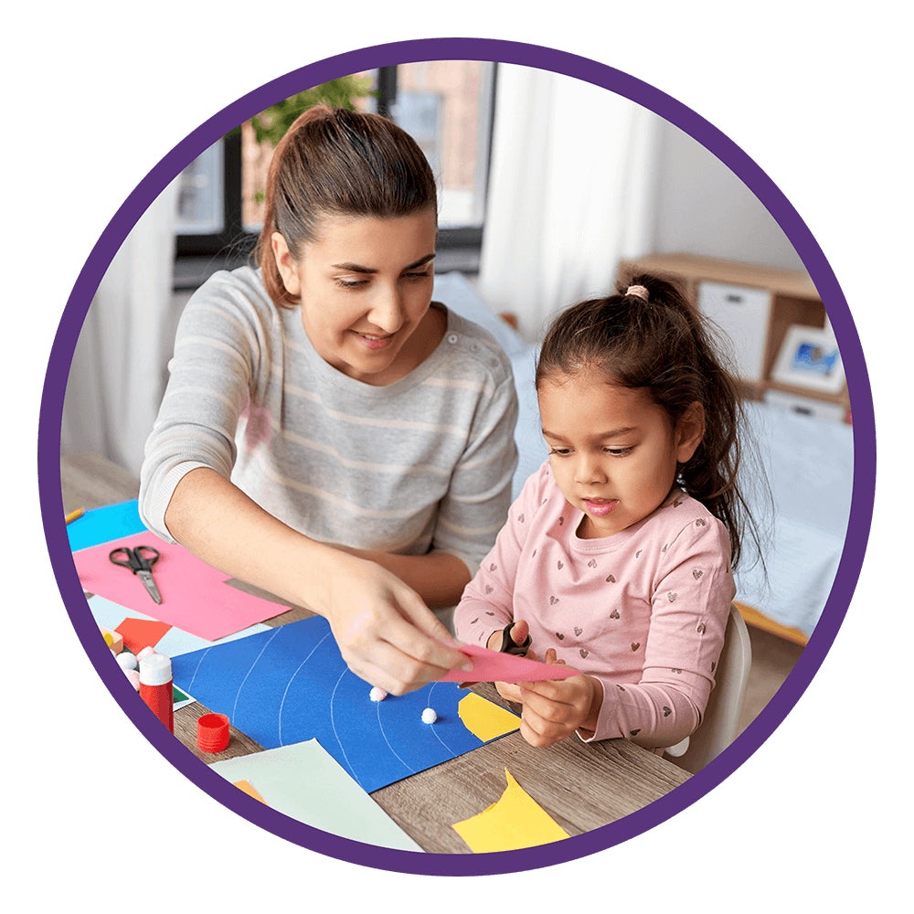 mother making crafts with her daughter