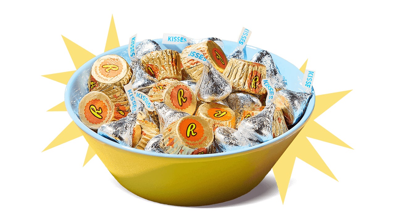 bowl of reeses miniature peanut butter cups and hersheys kisses milk chocolates