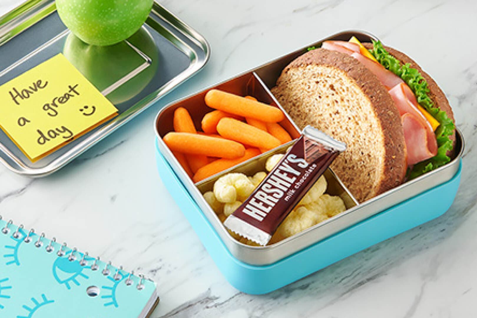 school lunchbox with hersheys snacks and chocolate candy