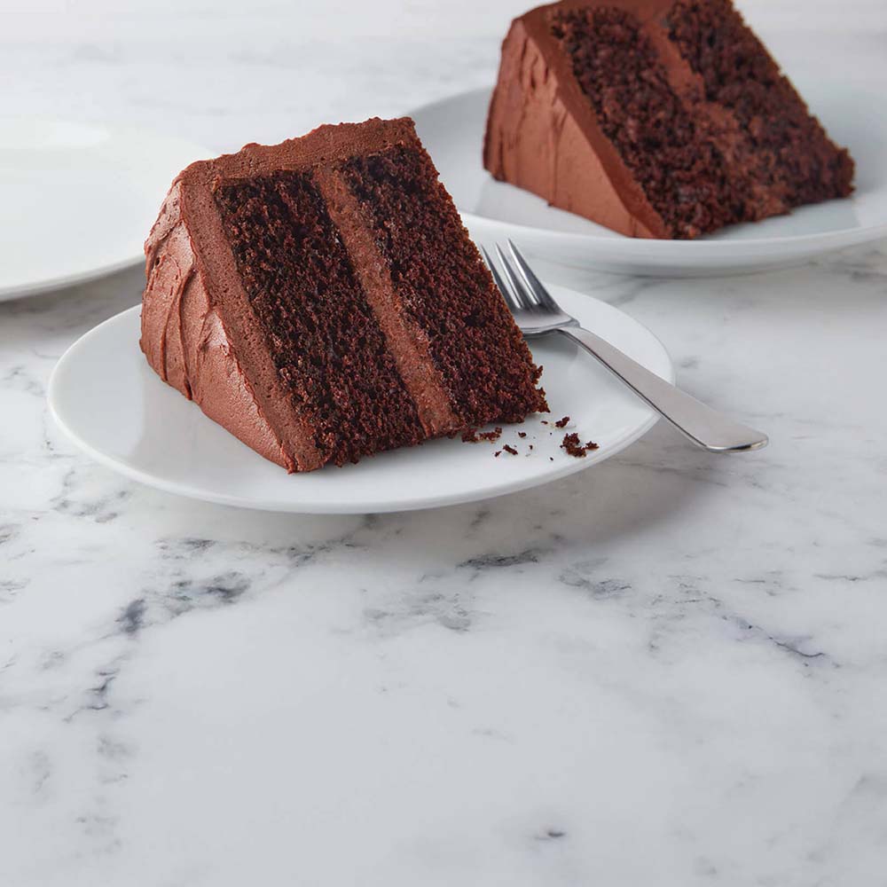 slices of hersheys perfectly chocolate chocolate cake on serving dishes